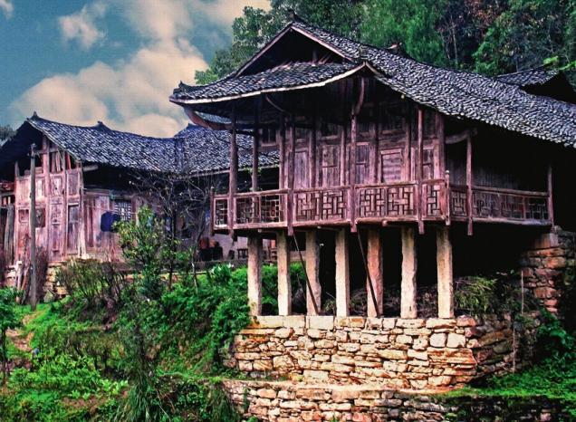 the stilted buildings of the tujia people