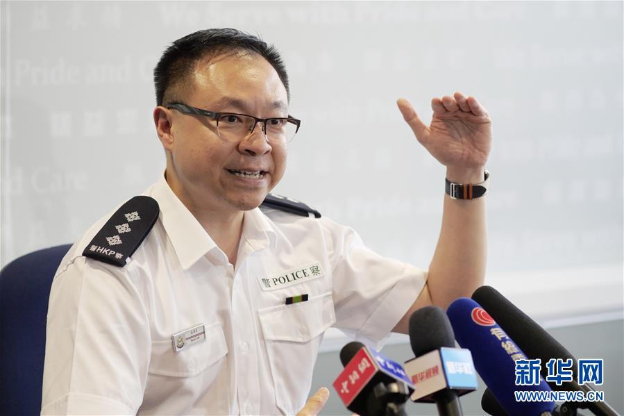 在香港警察总部,香港警务处沙田警区行动主任总督察,谈判专家林景升