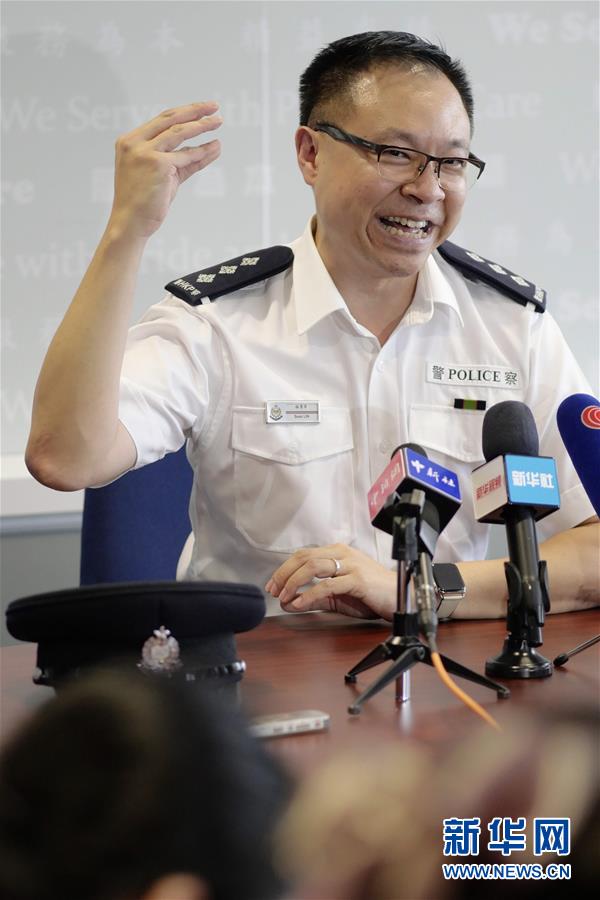 在香港警察总部,香港警务处沙田警区行动主任总督察,谈判专家林景升